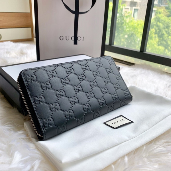 G*u*i leather zip around wallet
