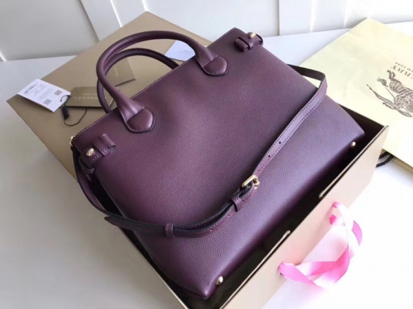 B**rry the medium banner in leather and house check