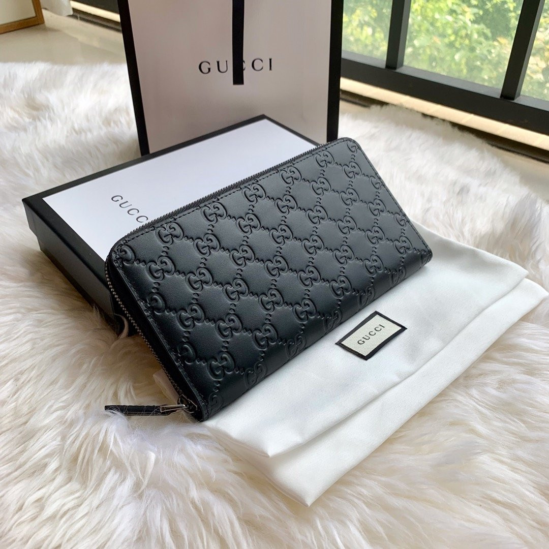 G*u*i leather zip around wallet
